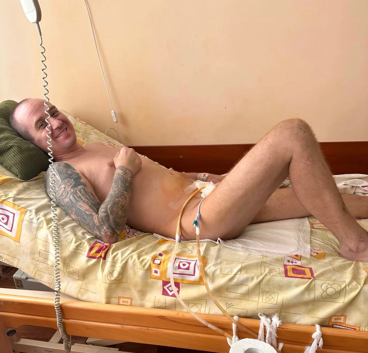 Roman during recovery with a bandaged arm